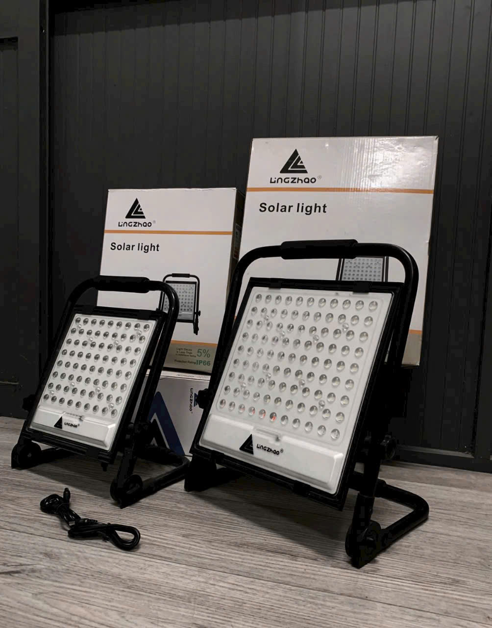 Cabin đen pha  tích điện cầm tay 100W